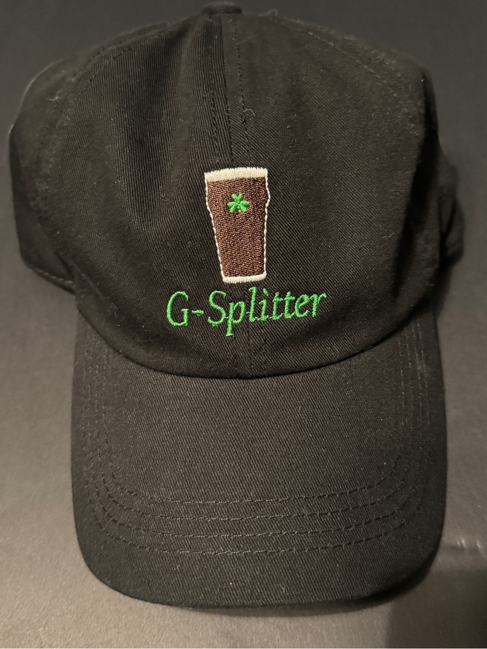 David and Young Black Baseball Cap with Green and Brown Embroidery
